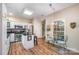 Charming kitchen with a breakfast nook, stainless steel appliances, and granite counters at 5208 Black Oak Ln, Waxhaw, NC 28173