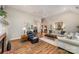 Bright living room with hardwood floors, fireplace, and open concept layout at 5208 Black Oak Ln, Waxhaw, NC 28173