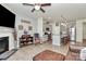 Open concept living space featuring modern gray cabinets, stainless steel appliances, and eat-in island at 5391 Orchid Bloom Dr, Fort Mill, SC 29707