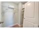 Walk-in closet with wire shelving and carpeted floors to keep your wardrobe organized at 5666 Stafford Rd # 9, Charlotte, NC 28054