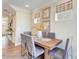 Dining room features natural light, wood table, and neutral colors at 5666 Stafford Rd # 9, Charlotte, NC 28054