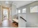 Hallway with bench and multiple windows at 5666 Stafford Rd # 9, Charlotte, NC 28054