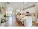 Contemporary kitchen with stainless steel appliances, white cabinets, and a spacious kitchen island at 5666 Stafford Rd # 9, Charlotte, NC 28054
