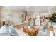 Spacious open floor plan with a cozy living area, a modern kitchen, and beautiful staircase at 5666 Stafford Rd # 9, Charlotte, NC 28054