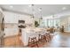Modern kitchen with stainless steel appliances and a large center island overlooking the living room at 5666 Stafford Rd # 9, Charlotte, NC 28054