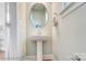 Pedestal sink powder room with oval mirror at 5666 Stafford Rd # 9, Charlotte, NC 28054
