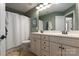 Bathroom with double vanity and shower-tub at 5951 Carrollton Ln, Charlotte, NC 28210