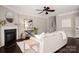 Cozy living room showcases fireplace, stylish decor, and dark hardwood flooring at 5951 Carrollton Ln, Charlotte, NC 28210