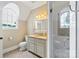 A stylish bathroom featuring a glass enclosed shower and a single sink vanity at 6132 Sharon Rd, Charlotte, NC 28210