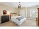 Bedroom featuring a cozy bed, neutral paint colors and natural light from a window at 6132 Sharon Rd, Charlotte, NC 28210