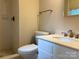Neutral bathroom with tile shower and tile floors at 7212 Bradley Ct, Charlotte, NC 28227