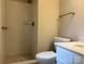 Neutral bathroom with tile shower and tile floors at 7212 Bradley Ct, Charlotte, NC 28227