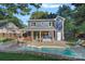 Stunning backyard featuring a pool, patio, and outdoor seating at 8007 Maxwelton Dr, Huntersville, NC 28078