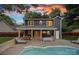 Backyard pool with a cozy covered patio with outdoor seating at 8007 Maxwelton Dr, Huntersville, NC 28078
