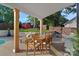Covered patio featuring a dining table and outdoor lounge chairs at 8007 Maxwelton Dr, Huntersville, NC 28078