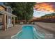 Backyard pool with privacy fence, lounge chairs and BBQ area at 8007 Maxwelton Dr, Huntersville, NC 28078