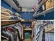 Spacious walk-in closet with ample shelving and hanging space for organized storage at 8007 Maxwelton Dr, Huntersville, NC 28078