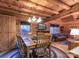 Charming dining room with wood table and chairs, perfect for Gathering meals and gatherings at 95 Odell Ct, Taylorsville, NC 28681