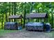 Exterior shot of covered wood storage and grill area at 95 Odell Ct, Taylorsville, NC 28681