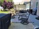 Back patio featuring an outdoor dining area with comfortable seating at 103 Doyle Farm Ln, Mooresville, NC 28115