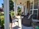 Inviting front porch with comfortable seating, decorative accents, and a welcoming atmosphere at 103 Doyle Farm Ln, Mooresville, NC 28115