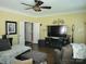 Inviting living room with cozy seating and an entertainment center fireplace at 103 Doyle Farm Ln, Mooresville, NC 28115