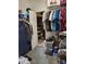 Walk-in closet with ample storage space and open access to the attic at 103 Doyle Farm Ln, Mooresville, NC 28115