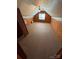 Spacious carpeted attic with natural light from a window, ready for storage or finishing at 103 Duke St, Great Falls, SC 29055
