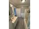 Traditional bathroom includes a tub/shower and a classic vanity at 103 Duke St, Great Falls, SC 29055