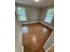 Bright bedroom featuring hardwood floors and two large windows at 103 Duke St, Great Falls, SC 29055