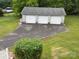 Large detached garage featuring three bays, with ample storage and workspace opportunities at 103 Duke St, Great Falls, SC 29055