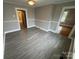 Spacious living room features durable flooring, fresh paint, and lots of natural light at 103 Duke St, Great Falls, SC 29055