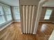 Open living room with hardwood floors and natural light at 103 Duke St, Great Falls, SC 29055