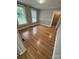 Cozy living room has hardwood flooring and bright windows at 103 Duke St, Great Falls, SC 29055