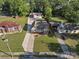 Beautiful home with large driveway, green lawn, and spacious detached garage at 107 Pressley St, Clover, SC 29710