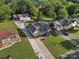 Charming home with lush green lawn, long driveway, and spacious detached garage at 107 Pressley St, Clover, SC 29710