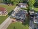 Aerial view of the property showcasing the home, spacious backyard, shed, and extended driveway at 107 Pressley St, Clover, SC 29710