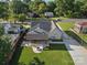 Enjoy outdoor living with a covered patio, fire pit, and lush green lawn at 107 Pressley St, Clover, SC 29710