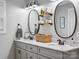 Bright bathroom with double vanity, modern fixtures, and decoratively displayed toiletries at 107 Pressley St, Clover, SC 29710