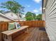 Relaxing deck space with wooden floors, bench, and an exterior view at 107 Pressley St, Clover, SC 29710
