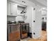 Modern laundry room with stainless steel washer and dryer, offering convenience at 107 Pressley St, Clover, SC 29710