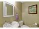 Well-lit powder room features a stylish sink and coordinated decor at 1110 Archer Farm Dr, Salisbury, NC 28144
