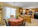 Cozy breakfast nook features a window, and seamless access to kitchen at 1110 Archer Farm Dr, Salisbury, NC 28144