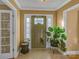 Foyer featuring tiled floors, neutral paint, a decorative front door and a plant at 1110 Archer Farm Dr, Salisbury, NC 28144