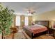 Large main bedroom features a ceiling fan, sitting area, and natural light at 1110 Archer Farm Dr, Salisbury, NC 28144
