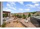 Backyard featuring a stone fire pit, hot tub, and a covered pergola with comfortable seating at 1111 Thessallian Ln, Indian Trail, NC 28079