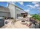Backyard featuring a stone fire pit, hot tub, and a covered pergola with comfortable seating at 1111 Thessallian Ln, Indian Trail, NC 28079
