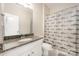 Bathroom featuring a granite countertop, white cabinetry, shark-themed shower curtain, and neutral wall paint at 1111 Thessallian Ln, Indian Trail, NC 28079