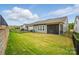 Well-maintained backyard with lush green lawn and fenced boundary at 1318 Encore Ln, Waxhaw, NC 28173