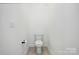 Powder room featuring a modern toilet and minimalist design at 1318 Encore Ln, Waxhaw, NC 28173